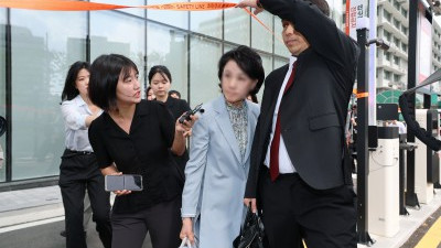 '묵묵부답' 통일교 총재 비서실장 정모 씨, '김건희 특검 출석'