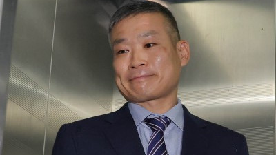 상기된 표정으로 특검 출석한 김동혁 전 국방부 검찰단장