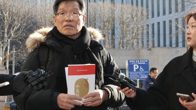 경찰 출석하는 김병헌 '위안부법폐지국민행동' 대표