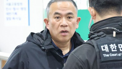 무상 여론조사’ 재판 출석하는 명태균 씨